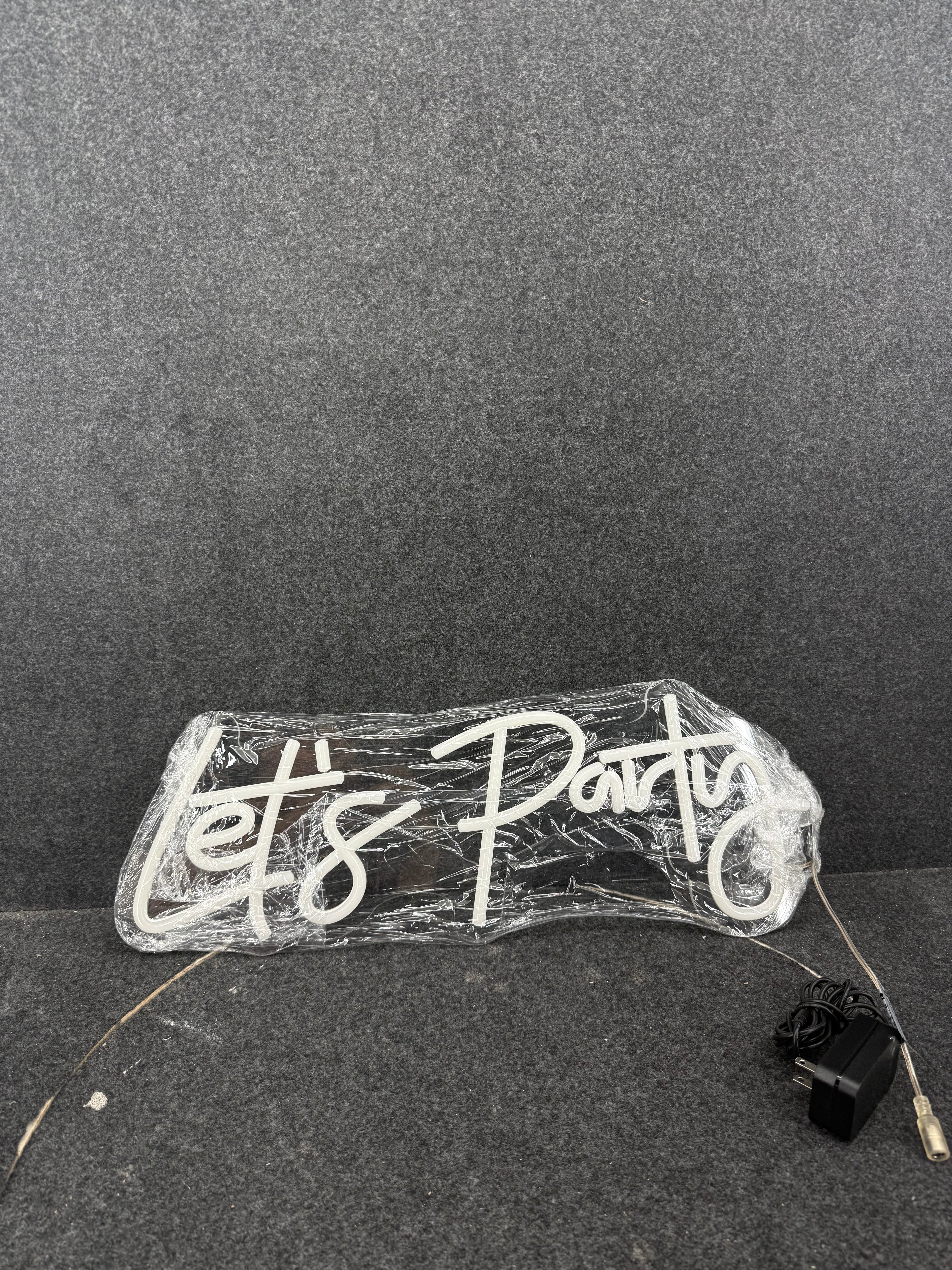 Neon Lets Party Sign