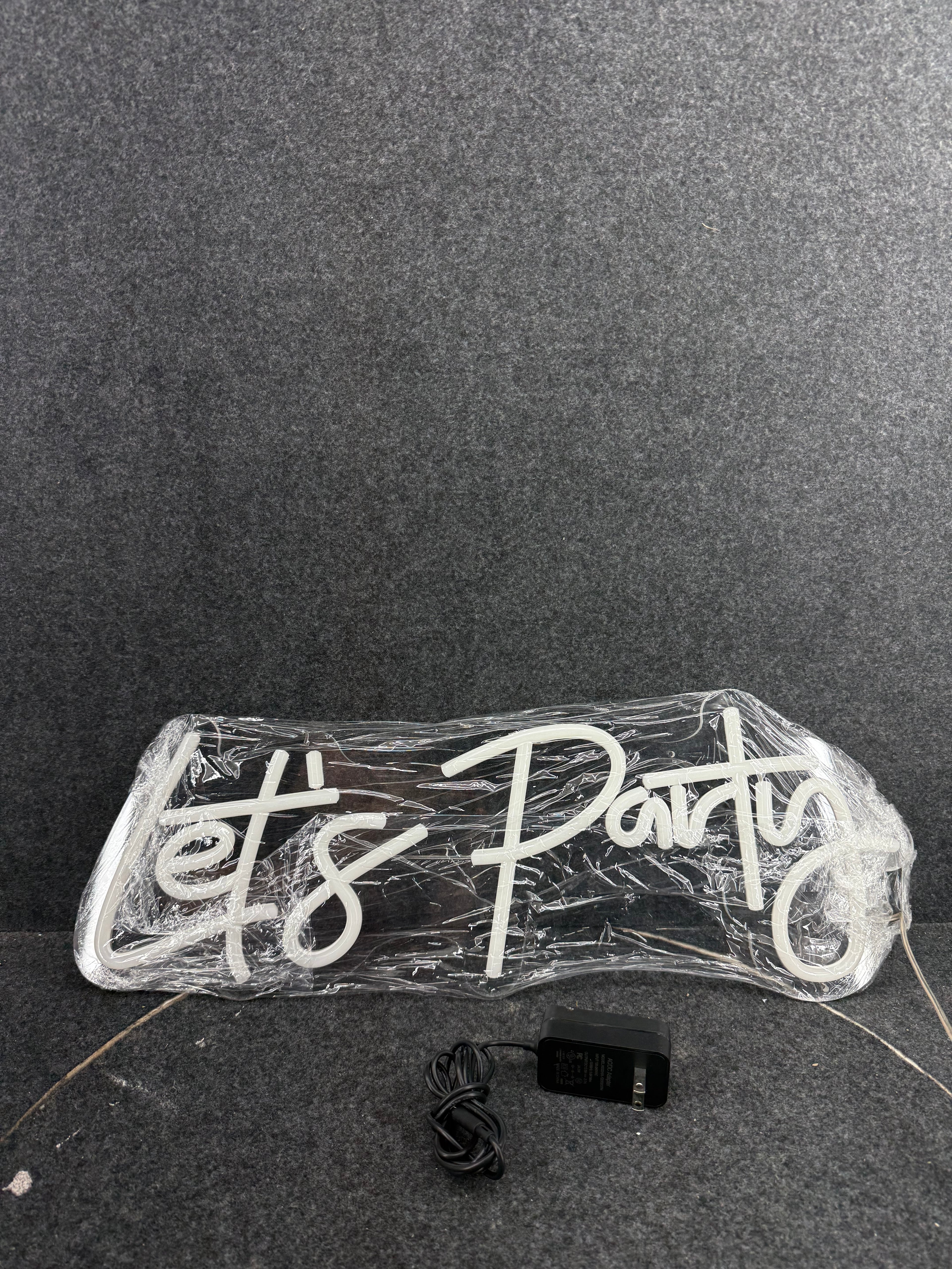 Neon Lets Party Sign